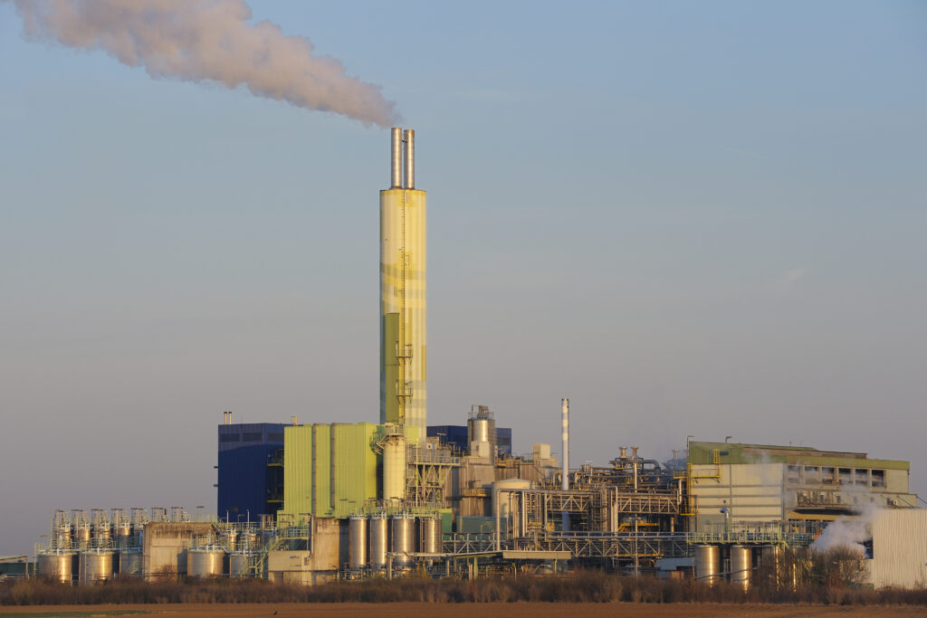 Waste incineration plant with rising smoke